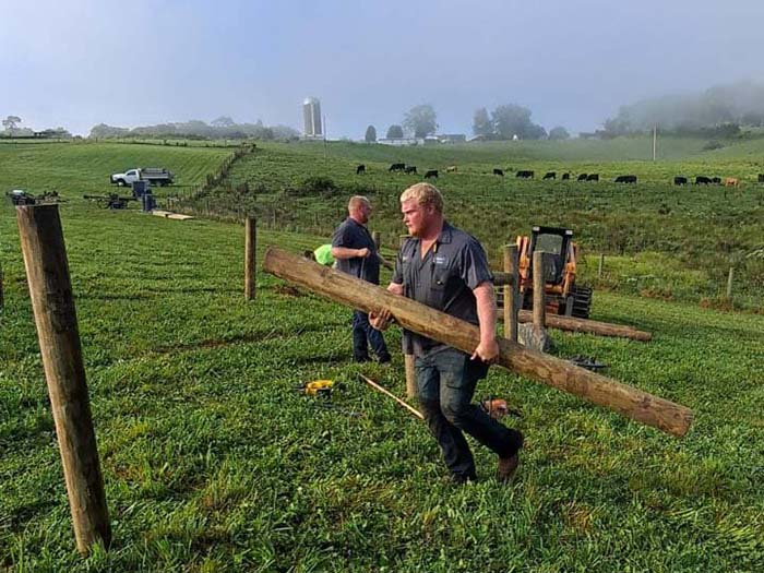 Photo of a Southern Indiana Fence Company installing a farm fence.