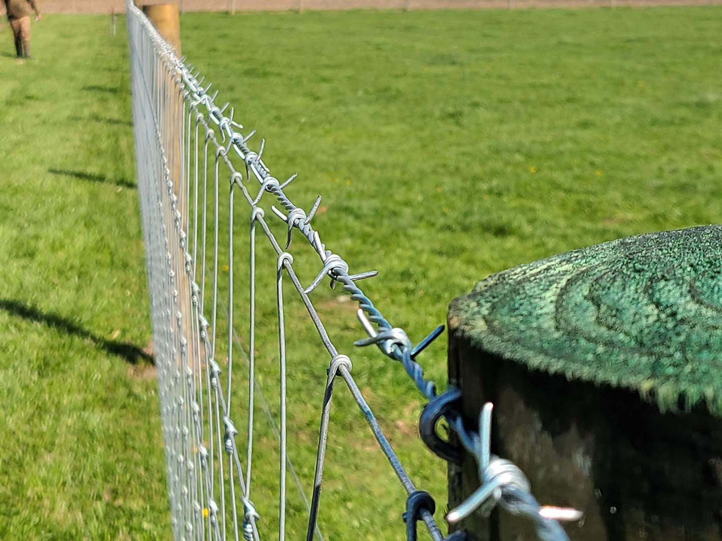 Photo of woven wire fence from a Bloomington IN fencing contractor